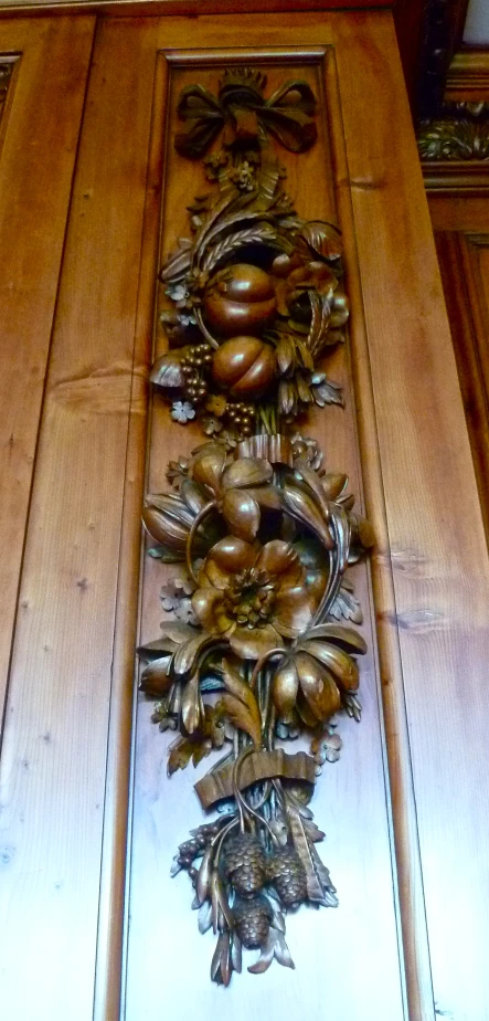 wooden door with an elegant motif in the middle