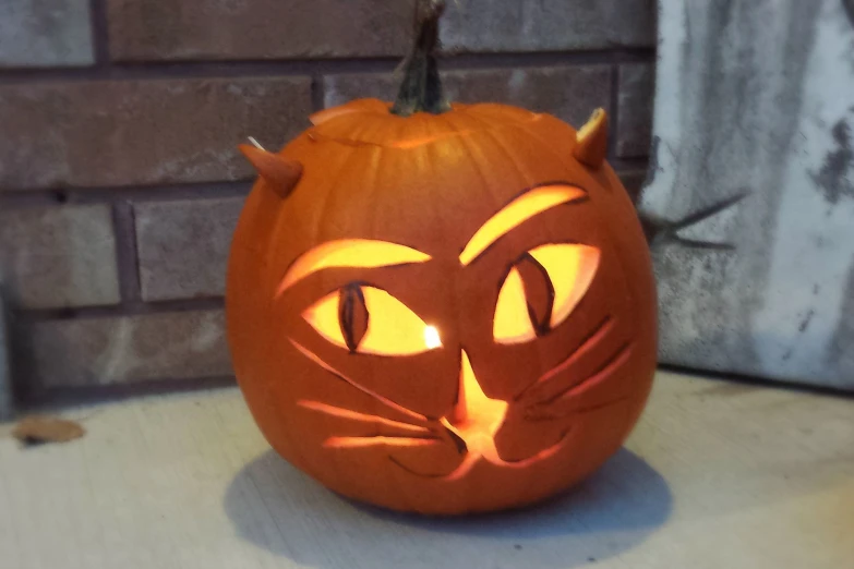 the jack o'lantern pumpkin is carved with an interesting face