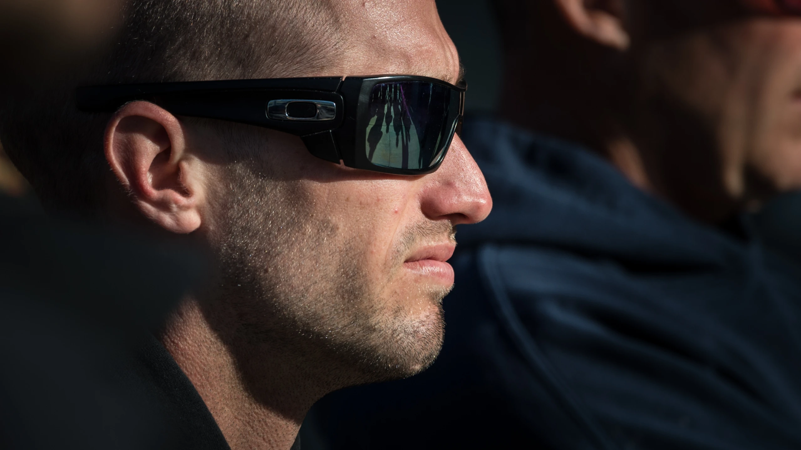 a man with shades on wearing sunglasses