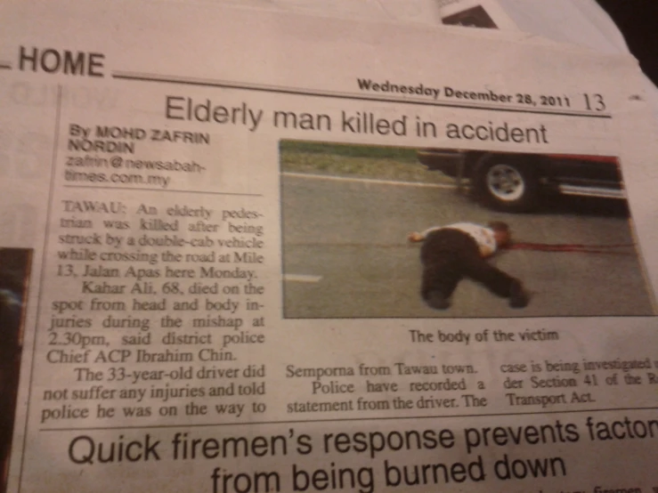 newspaper article, showing a picture of an older man ed in accident