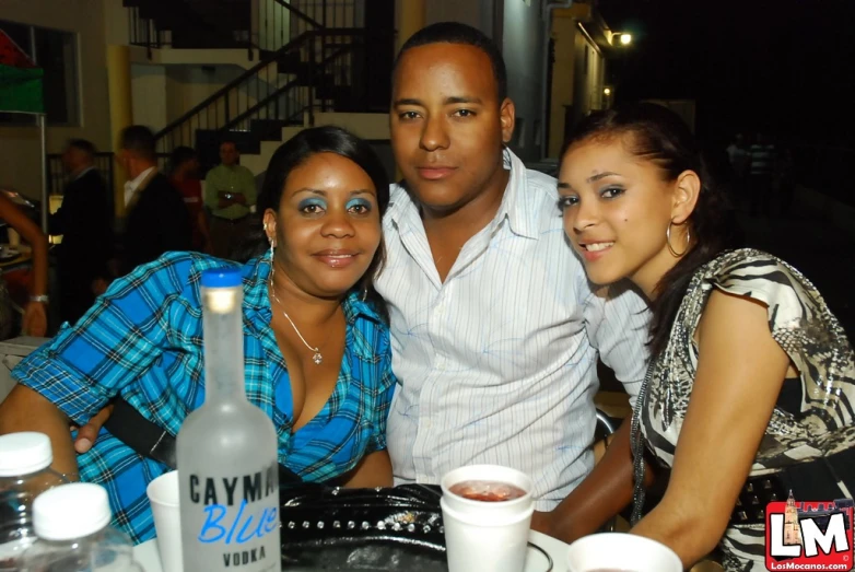 a group of people sitting at a table