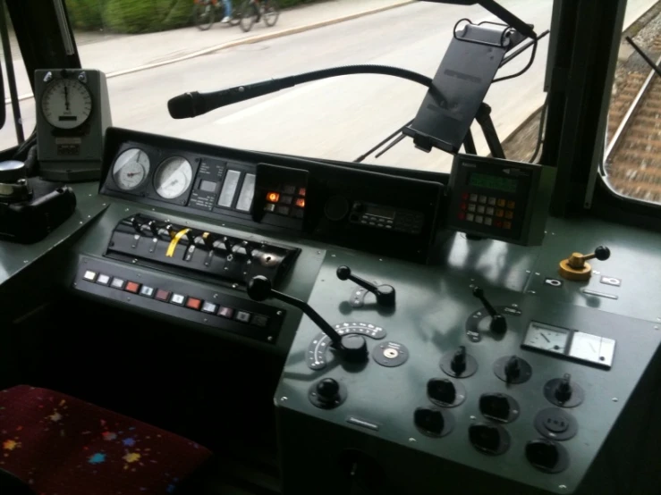 view of the cockpit of a bus from behind