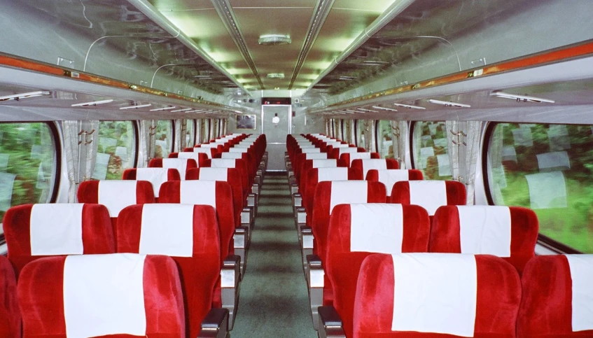 rows of seats lined up in the front of a bus