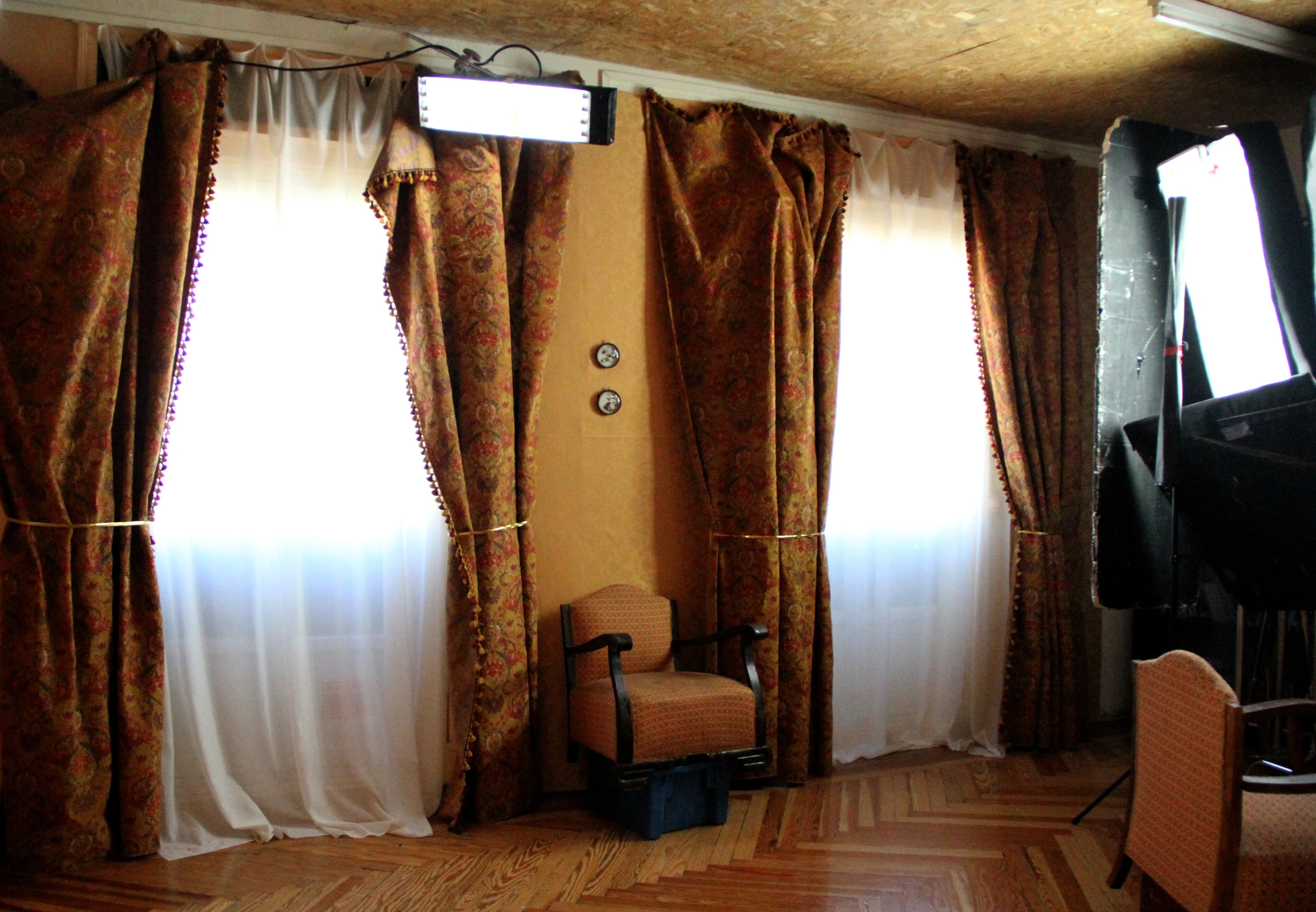 large open living room with a television on the wall