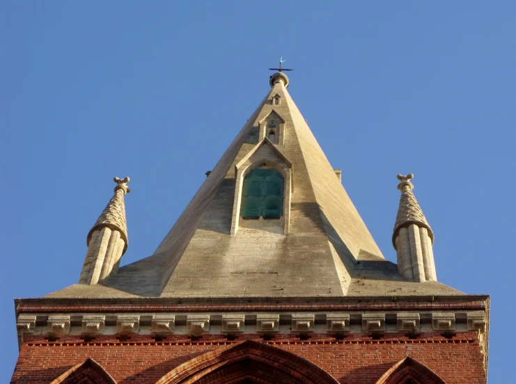 a clock tower with a blue sky in the background