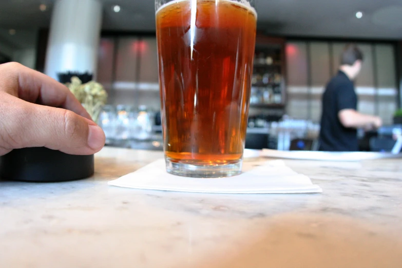 a beer that is sitting on top of a table