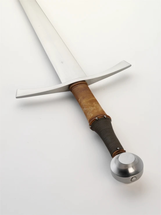 the large knife has a wooden handle on it