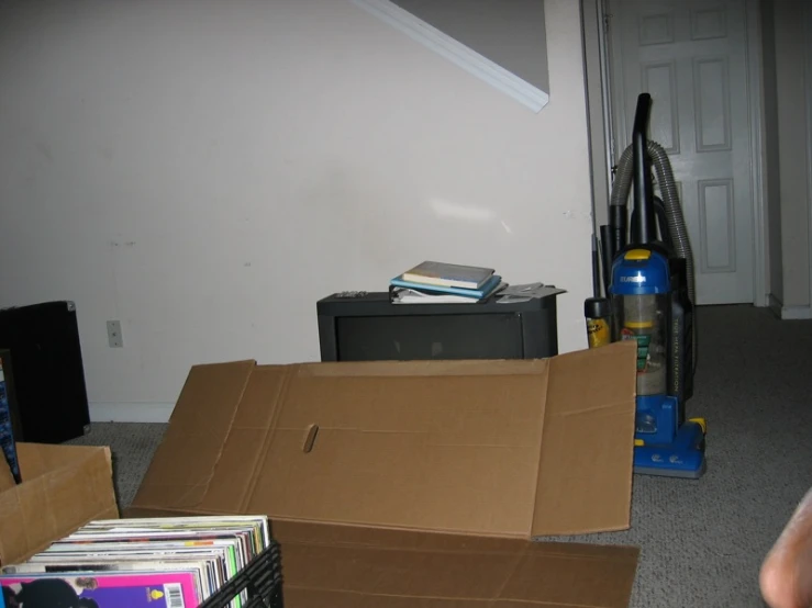boxes piled on the floor and stacked near each other