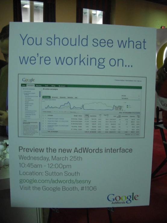 a sign advertising the adwords interface to people