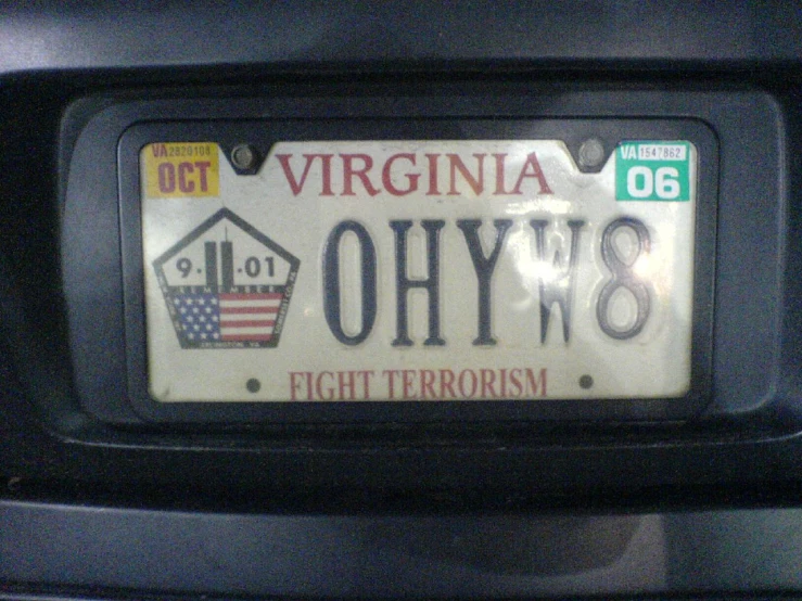 a vehicle plate with an american flag and the word ohyh
