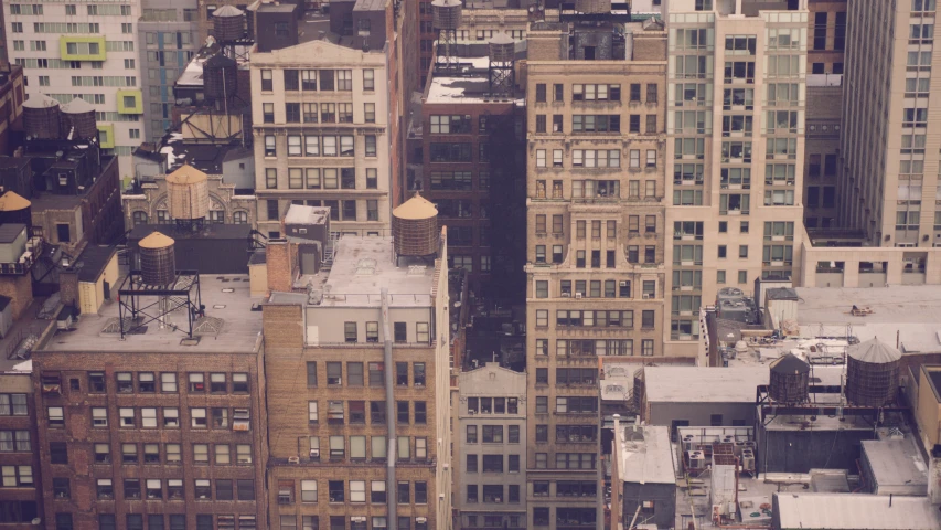 view of the roofs and side of tall buildings