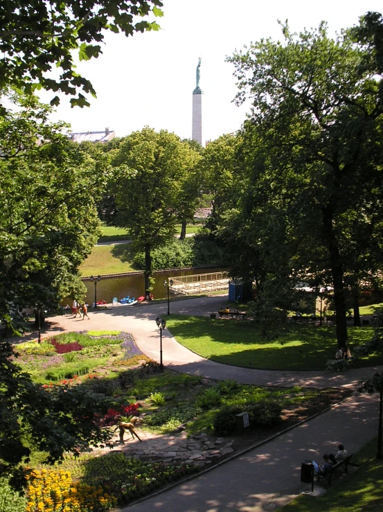 there are people walking through the park