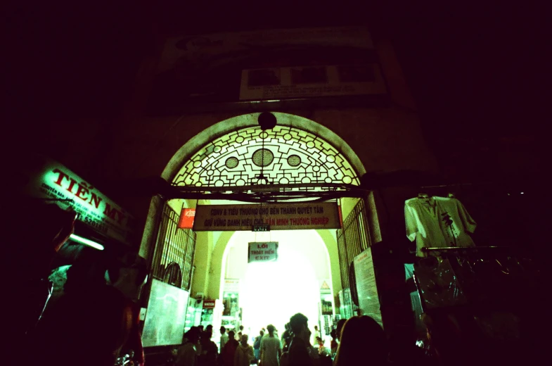 an entrance into a public space at night