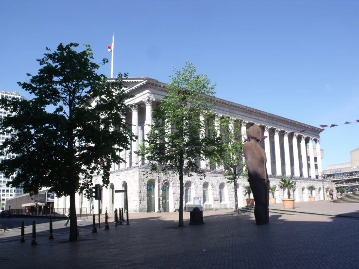 a large elephant statue in front of a building