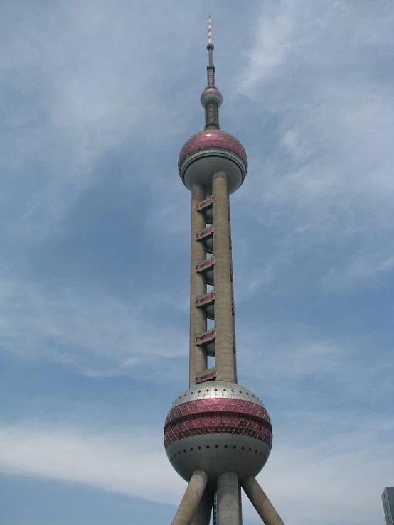 the oriental style building features red, white and silver accents