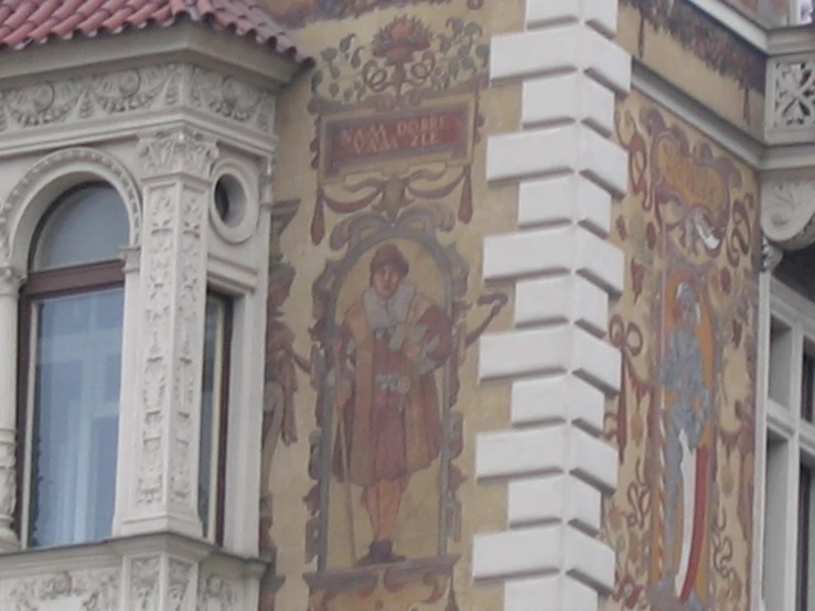 there are many ornately painted decorations on this building