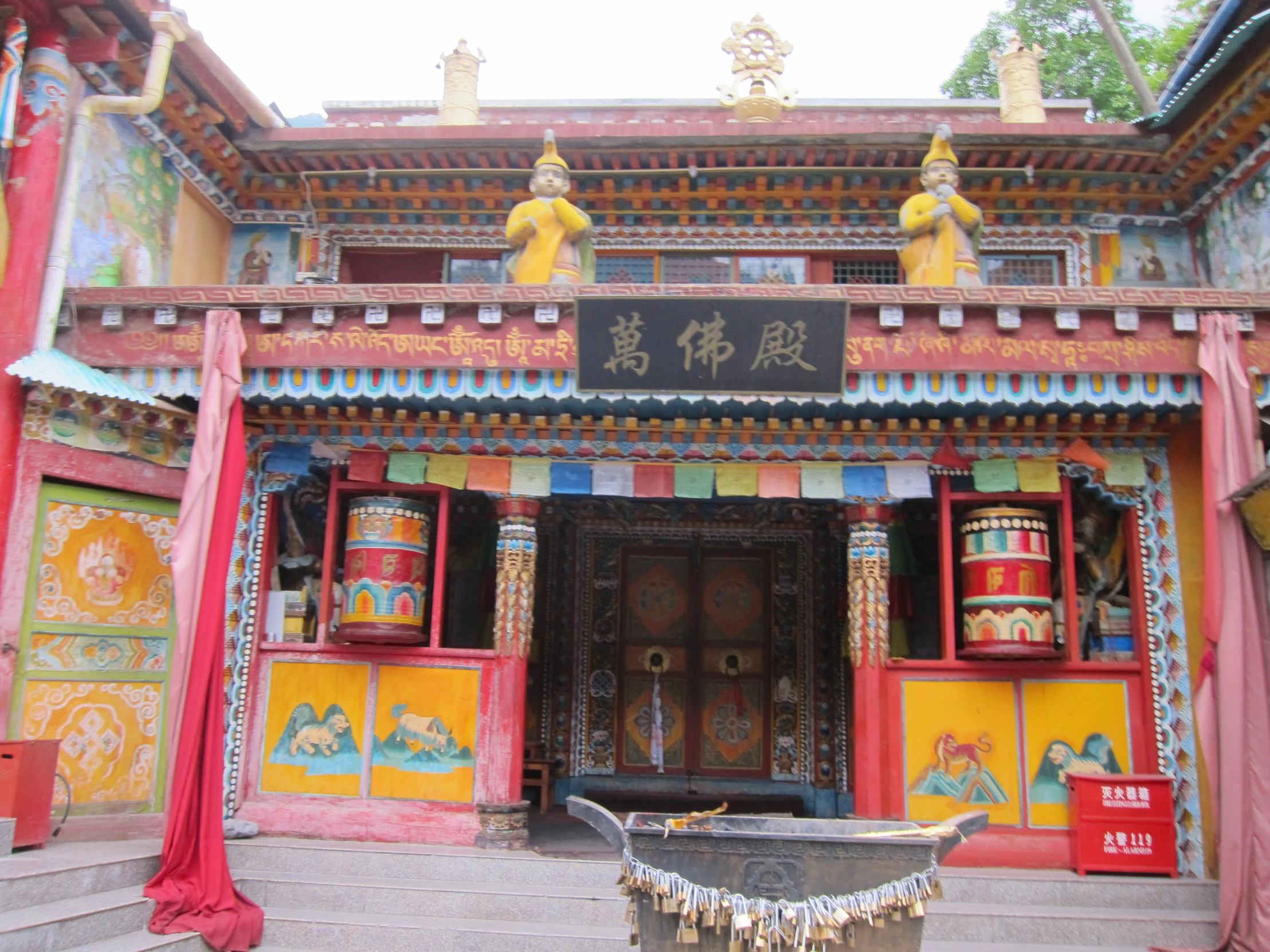 a chinese shrine decorated with colorful decorations