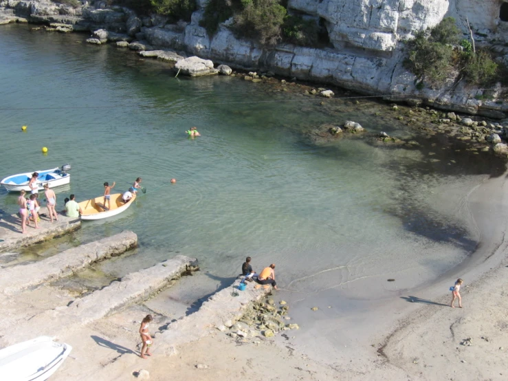 a group of people who are standing in the water