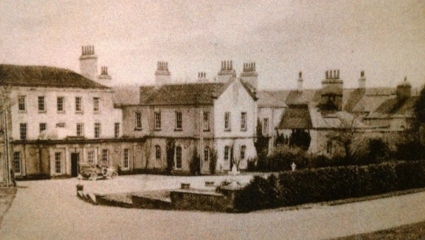 a view of several different buildings with towers