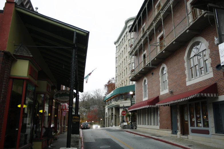 small town with buildings on either side of the road