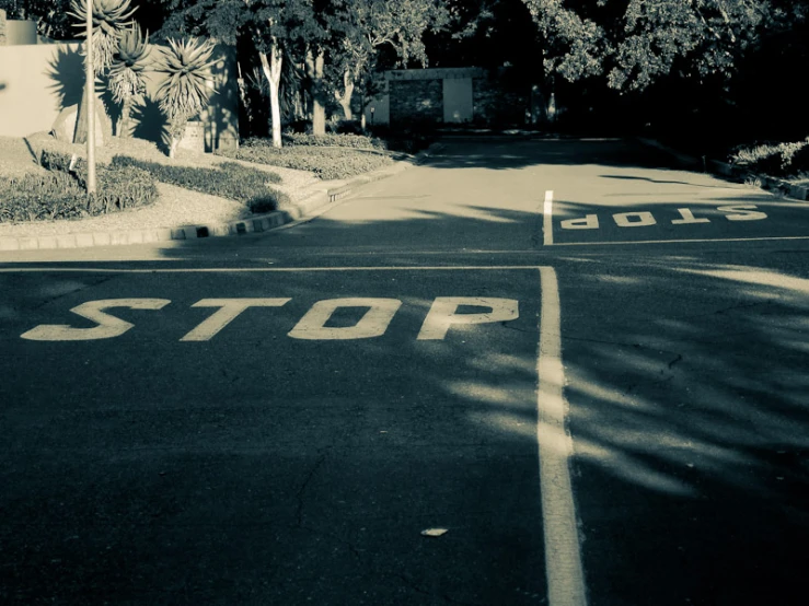 a stop sign with arrows painted on it