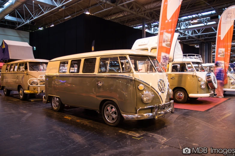 a number of cars parked on display near one another