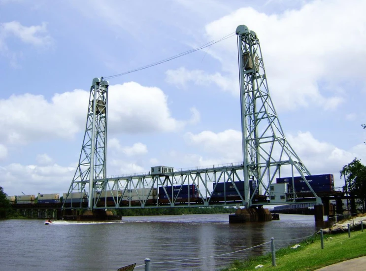 a large bridge that is over a lake