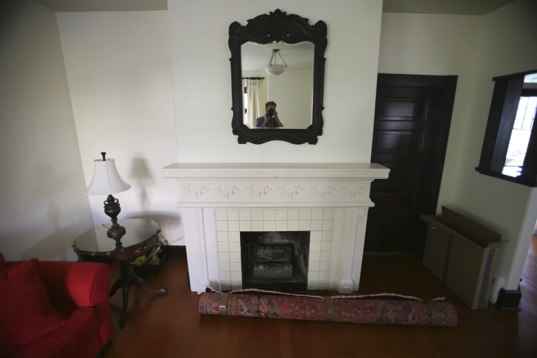 a fire place in the corner of a living room