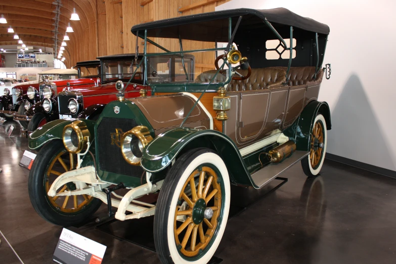 the antique cars are on display at the museum