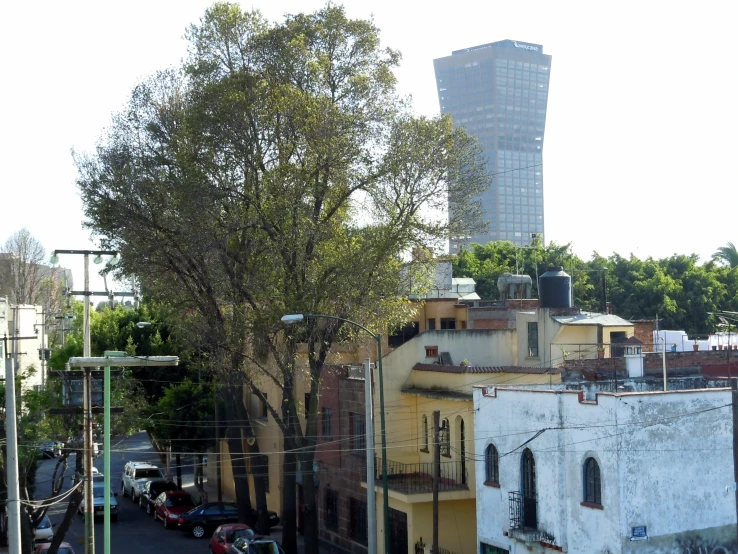 buildings in an area with a tower and buildings