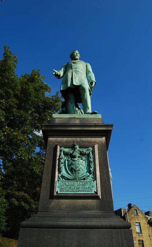 a statue of a man holding his hand out