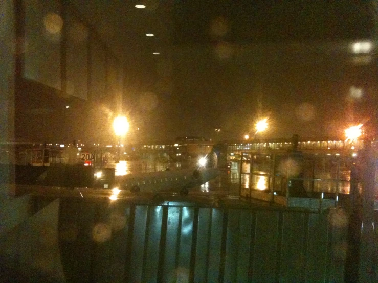 a view of a river at night from a balcony of a building