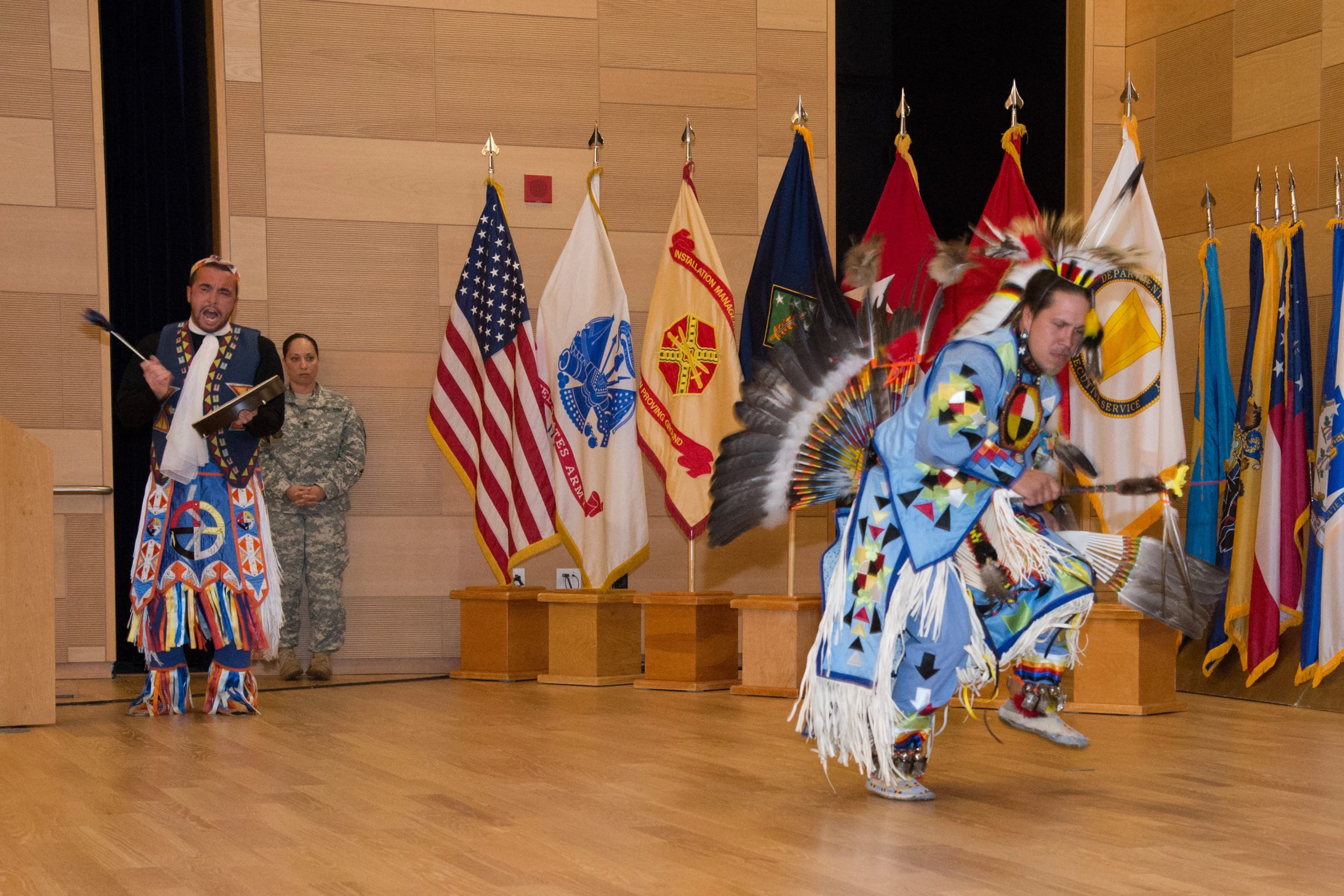 men in traditional costumes perform a traditional dances