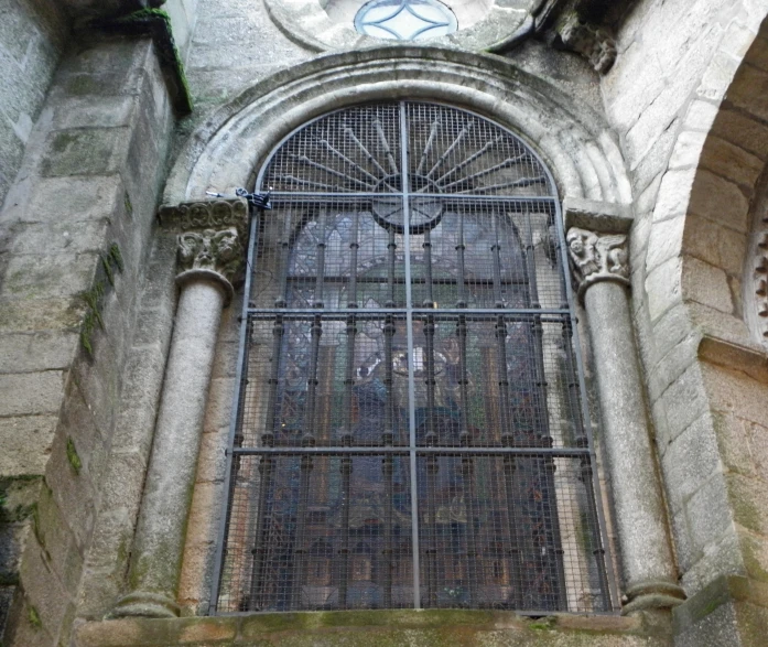 the church's windows and a clock face are artistic