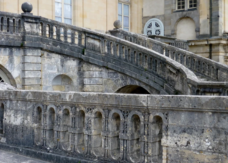 a stone stairway with several steps in front of it