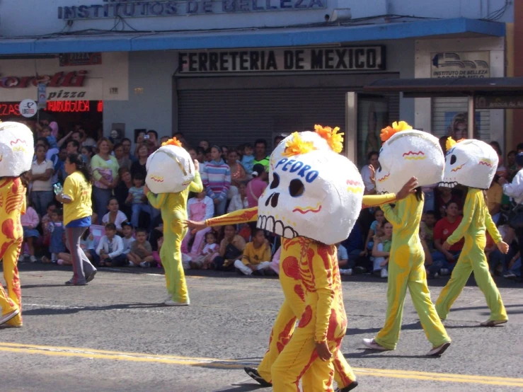 a group of people that are walking in the street