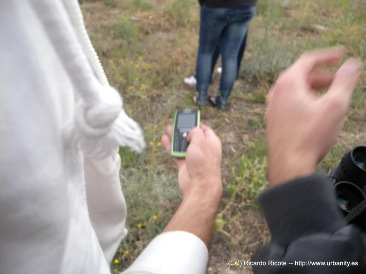 a close up of a person using a cell phone