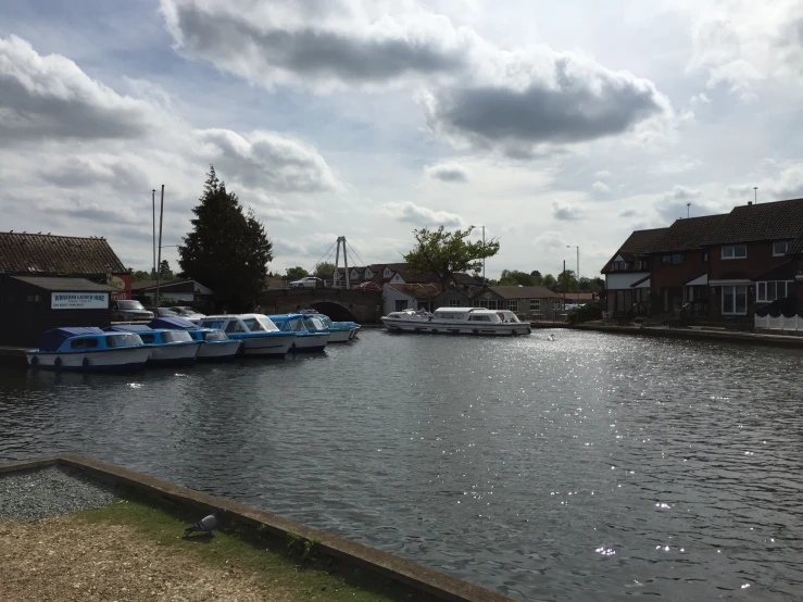 some boats that are docked in the water