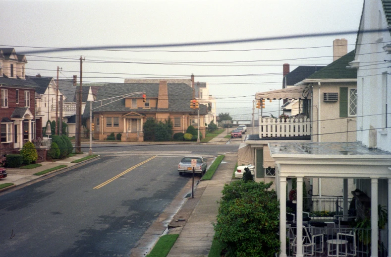 the street view with the car going down it