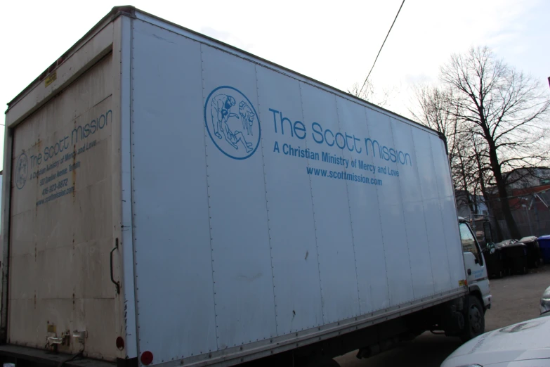 a moving trailer truck with the door opened