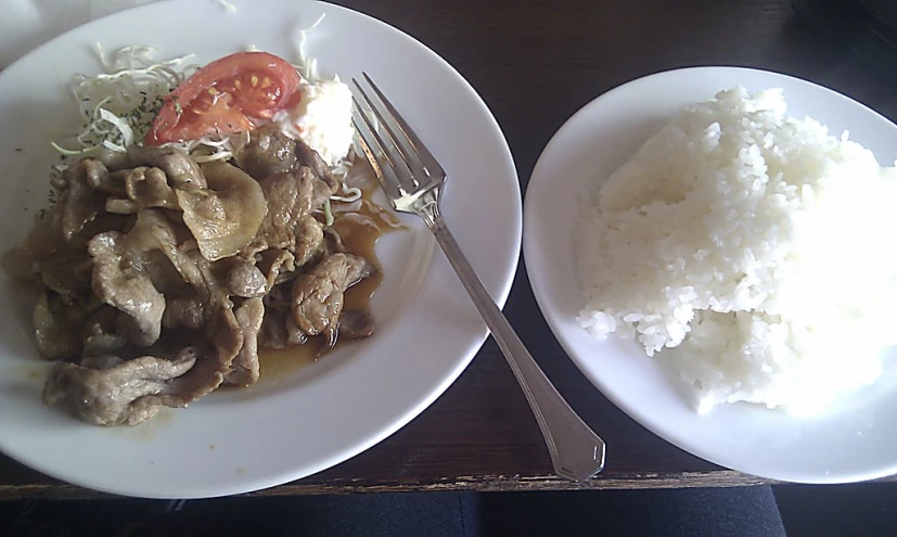 two plates that have different types of food on them