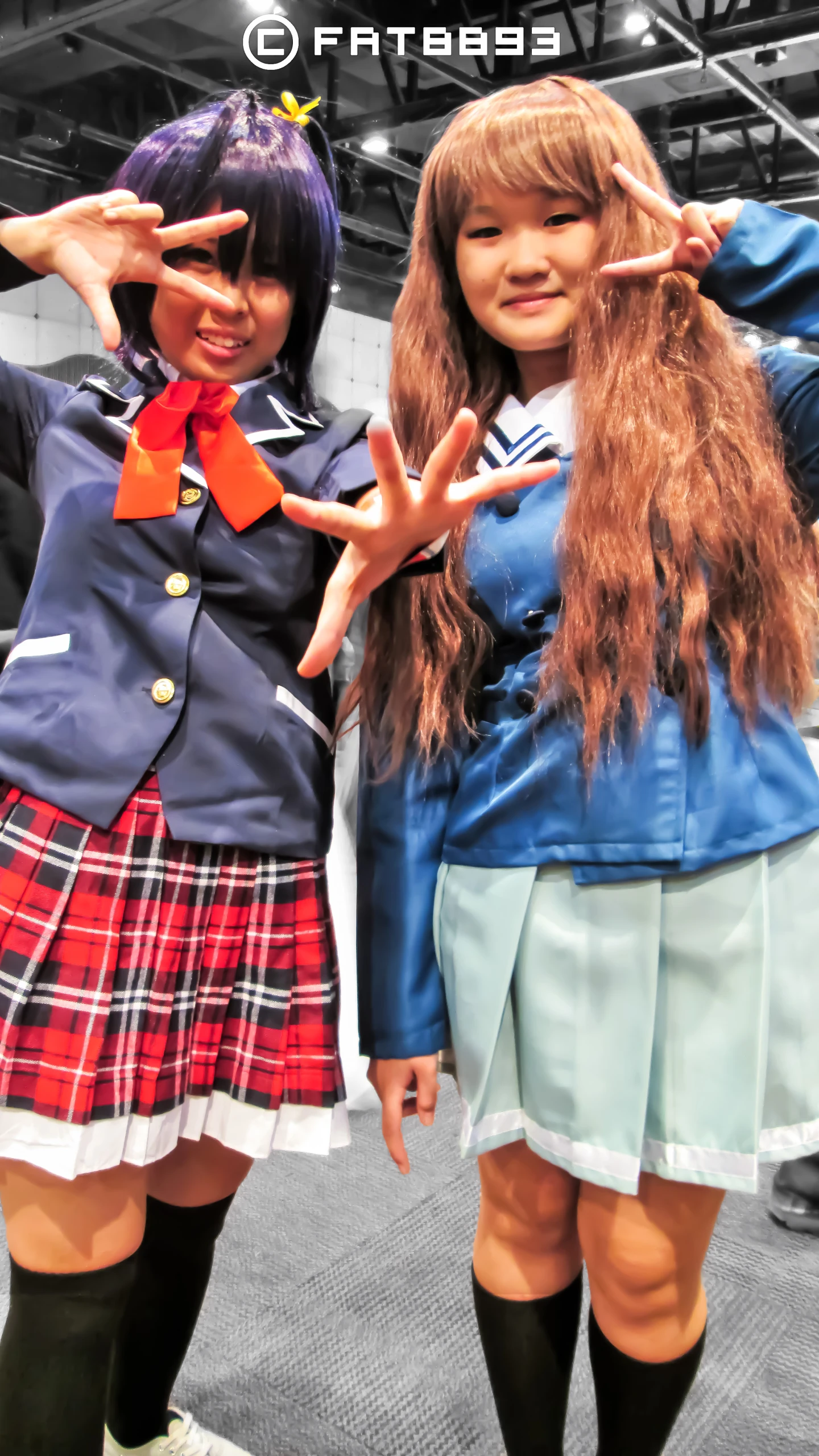 two young asian girls wearing school uniforms