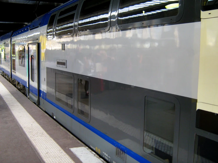 the front side of a subway train in a station