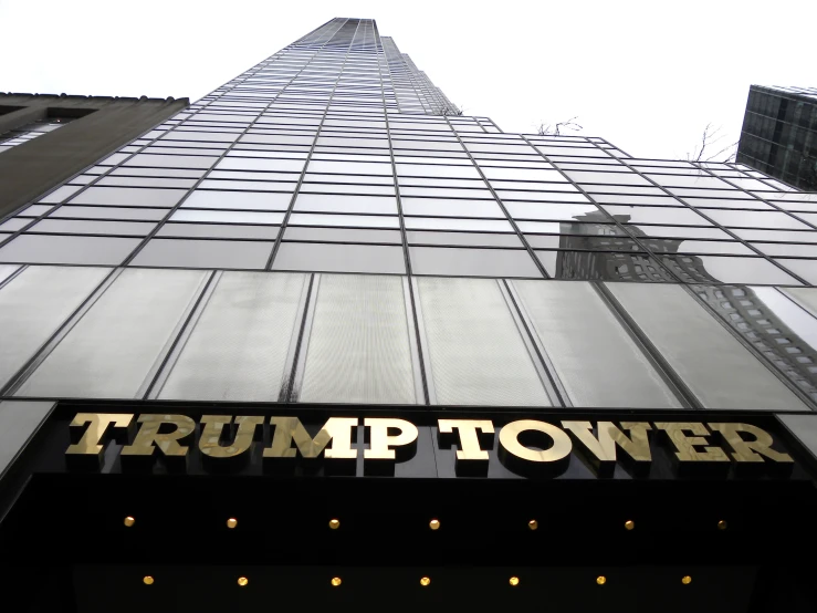 the trump tower in new york city, is seen through the windows