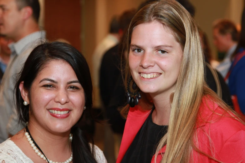 two women who are smiling at the camera