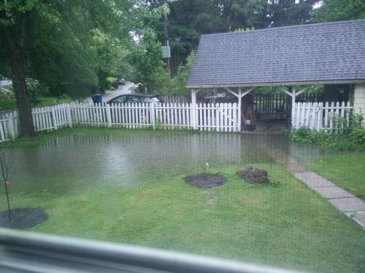 the backyard is flooded and it's flooding