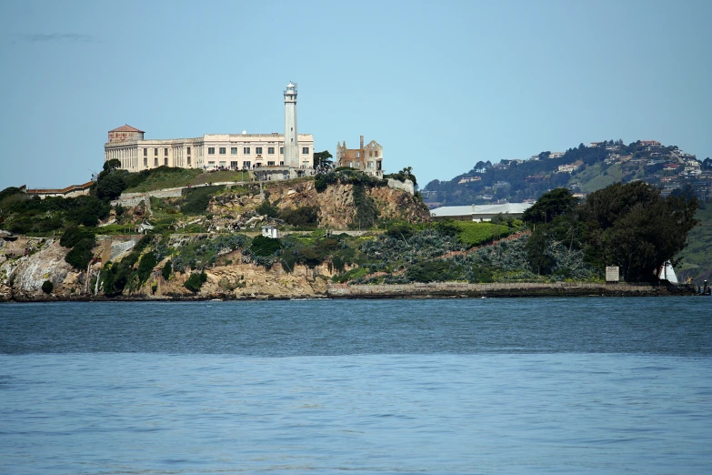 an old castle is perched on top of the hill