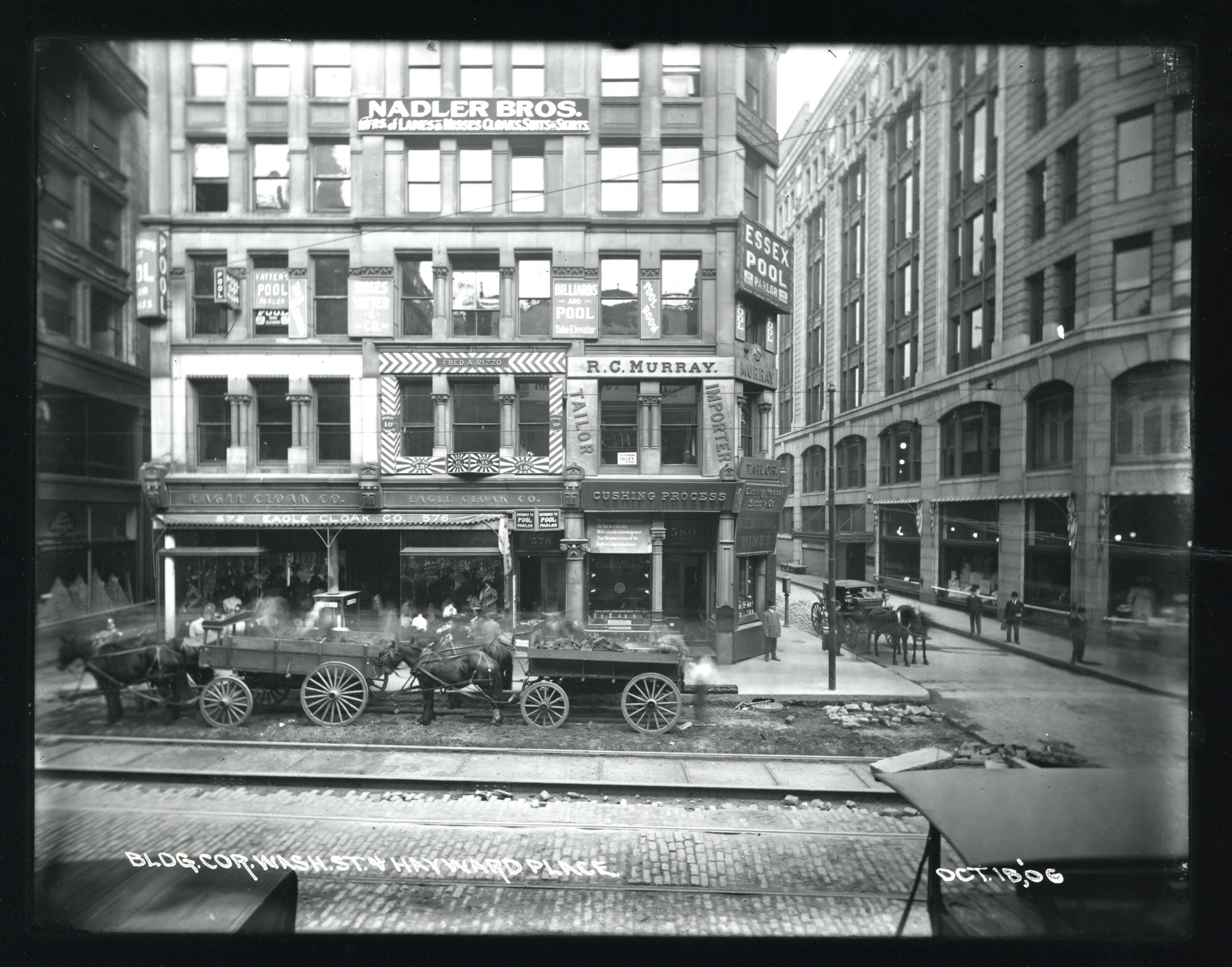 an old black and white po of a train in the city