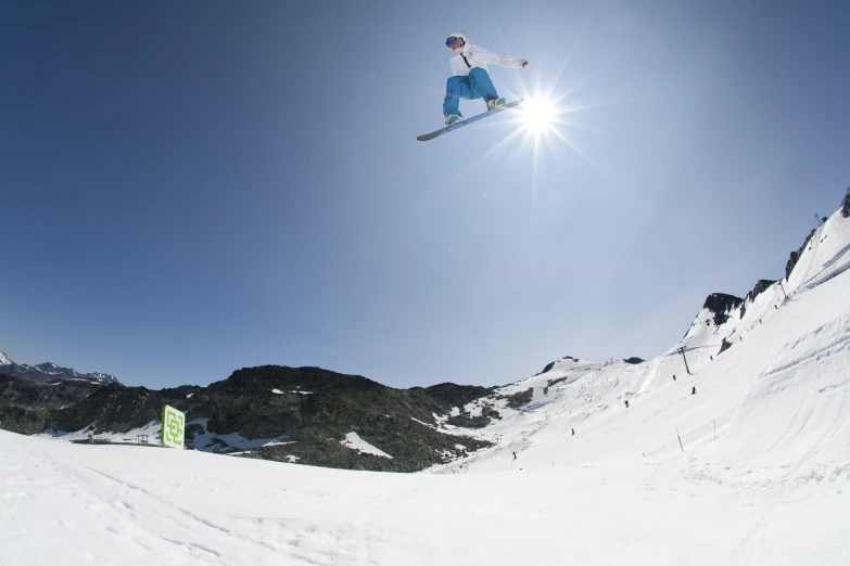 a person on skis jumps through the air