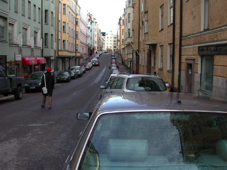 an image of a man walking down the street